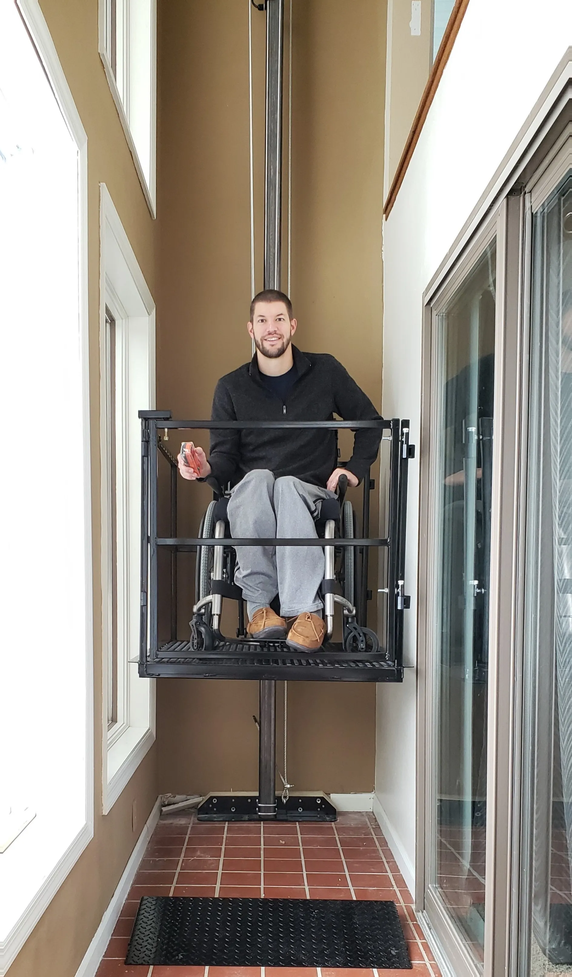 Custom indoor vertical platform lift installation