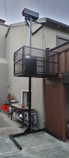 Vertical lift serving an elevated porch
