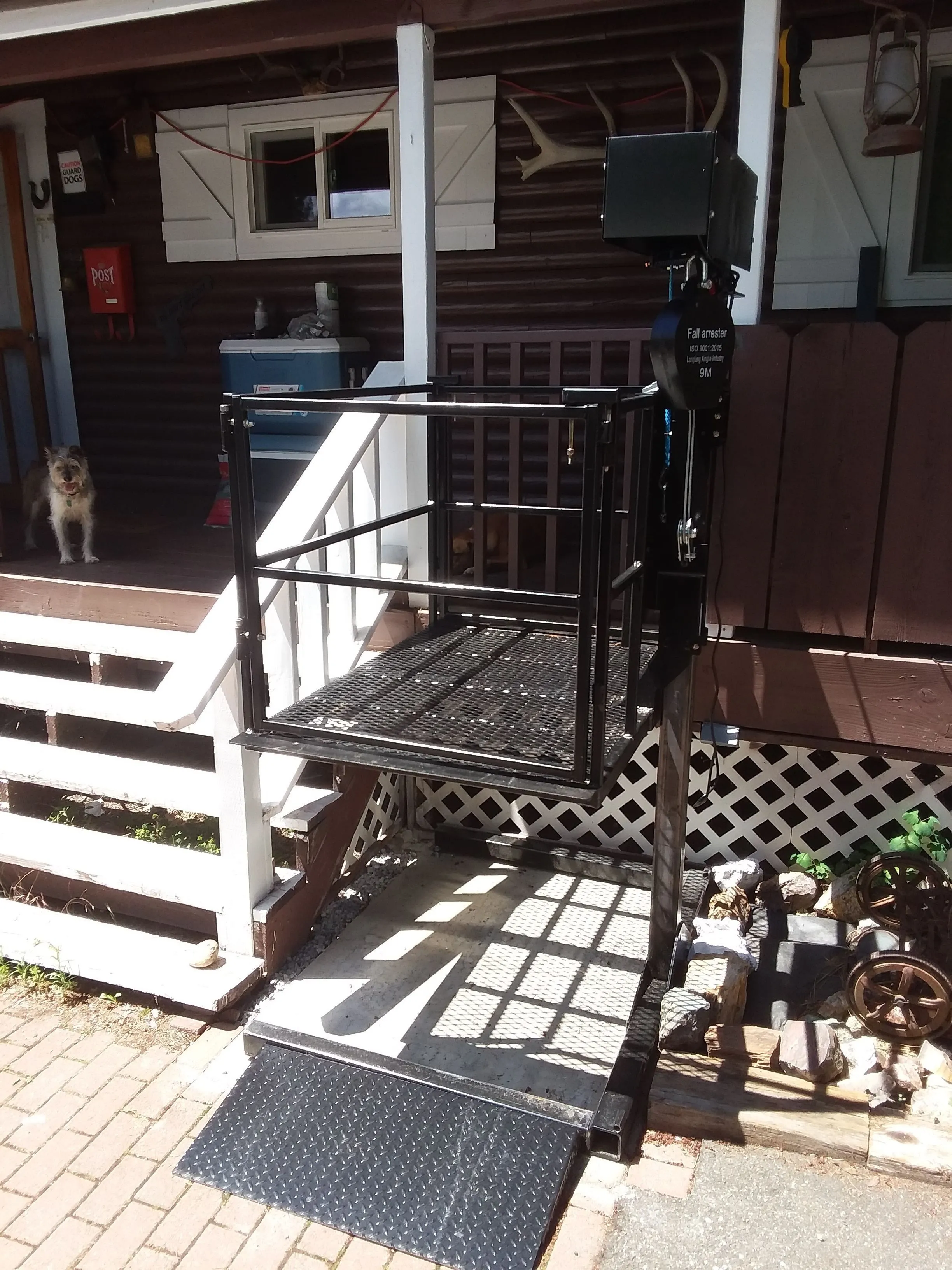 Vertical platform lift shown in its full home context